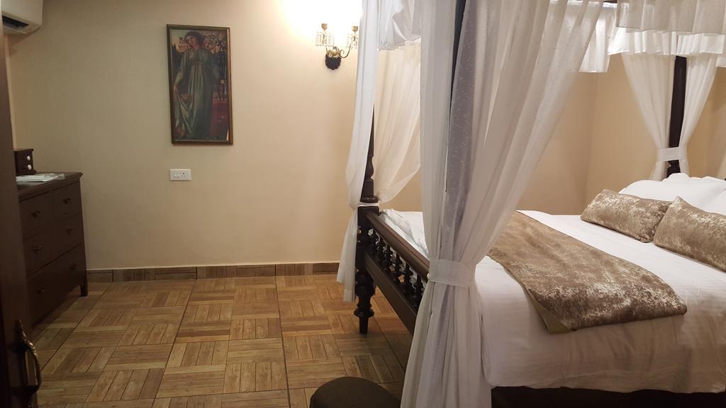 Casa Menezes - A Heritage Goan Homestay Bambolim Kamer foto