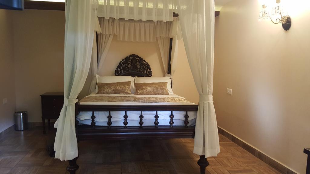 Casa Menezes - A Heritage Goan Homestay Bambolim Kamer foto